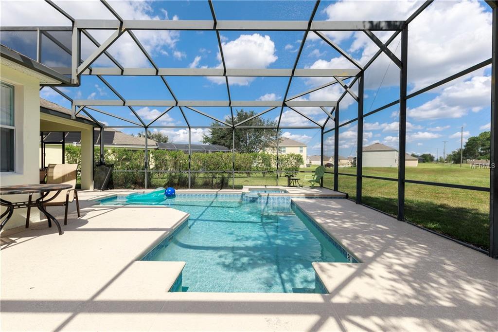 153 MINNIEHAHA CIRCLE, HAINES CITY, Florida 33844, 5 Bedrooms Bedrooms, 9 Rooms Rooms,4 BathroomsBathrooms,Residential,For sale,MINNIEHAHA,S4855277