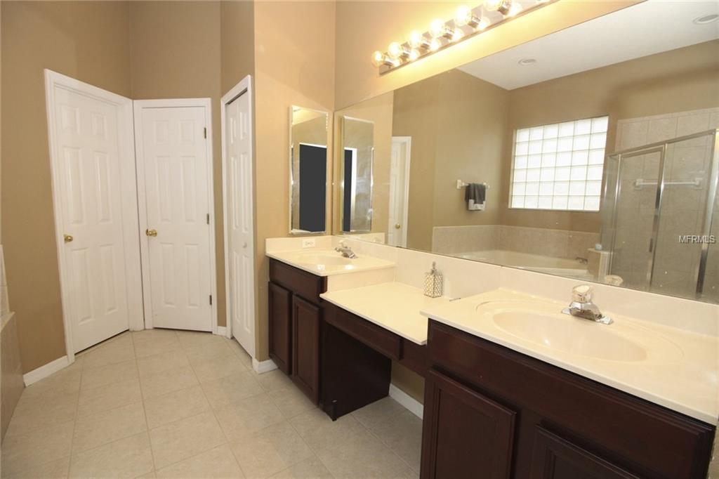 8493 LAKE WINDHAM AVENUE, ORLANDO, Florida 32829, 5 Bedrooms Bedrooms, 10 Rooms Rooms,3 BathroomsBathrooms,Residential,For sale,LAKE WINDHAM,O5556161