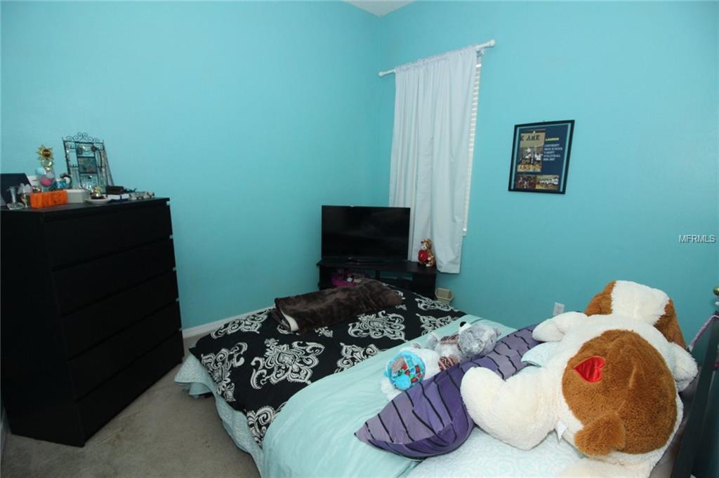 8493 LAKE WINDHAM AVENUE, ORLANDO, Florida 32829, 5 Bedrooms Bedrooms, 10 Rooms Rooms,3 BathroomsBathrooms,Residential,For sale,LAKE WINDHAM,O5556161