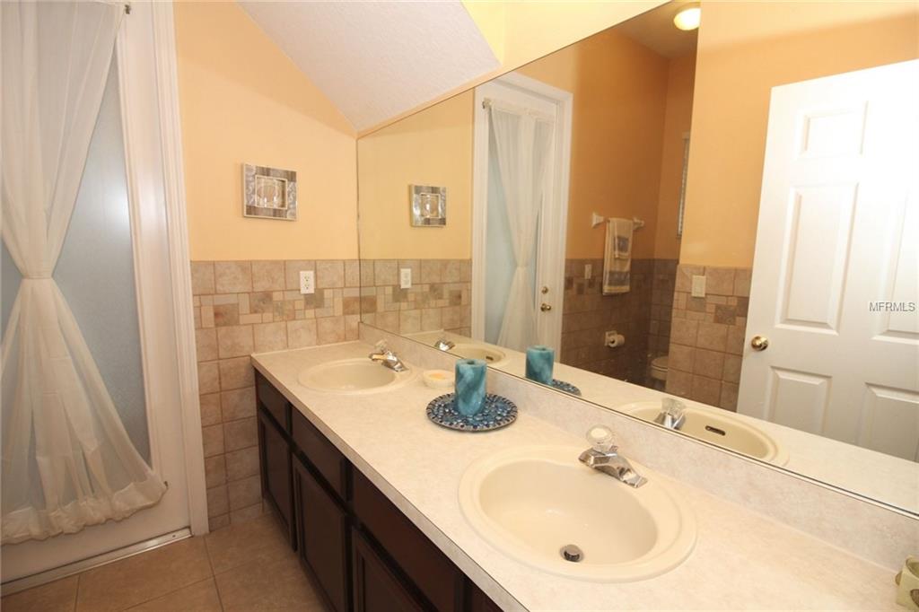 8493 LAKE WINDHAM AVENUE, ORLANDO, Florida 32829, 5 Bedrooms Bedrooms, 10 Rooms Rooms,3 BathroomsBathrooms,Residential,For sale,LAKE WINDHAM,O5556161