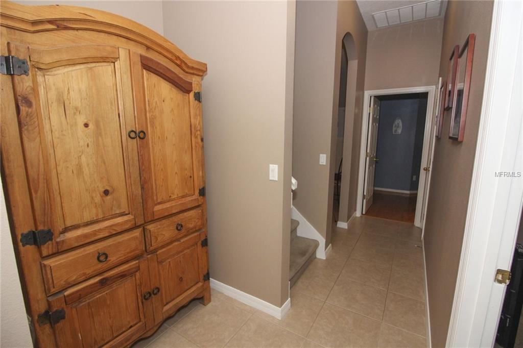 8493 LAKE WINDHAM AVENUE, ORLANDO, Florida 32829, 5 Bedrooms Bedrooms, 10 Rooms Rooms,3 BathroomsBathrooms,Residential,For sale,LAKE WINDHAM,O5556161