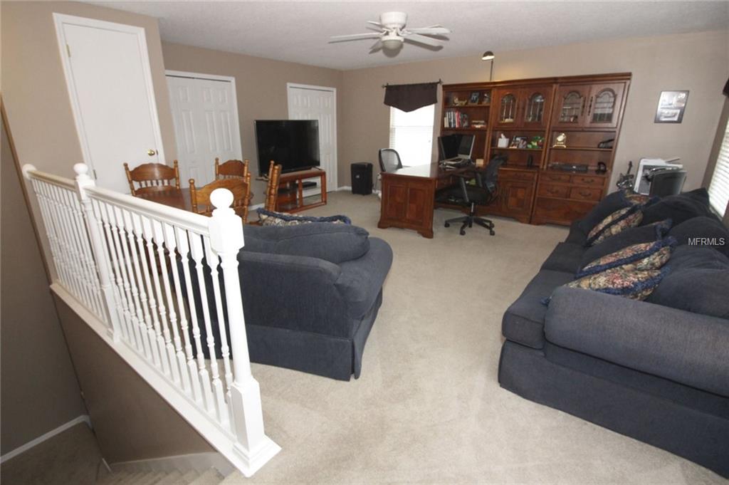 8493 LAKE WINDHAM AVENUE, ORLANDO, Florida 32829, 5 Bedrooms Bedrooms, 10 Rooms Rooms,3 BathroomsBathrooms,Residential,For sale,LAKE WINDHAM,O5556161