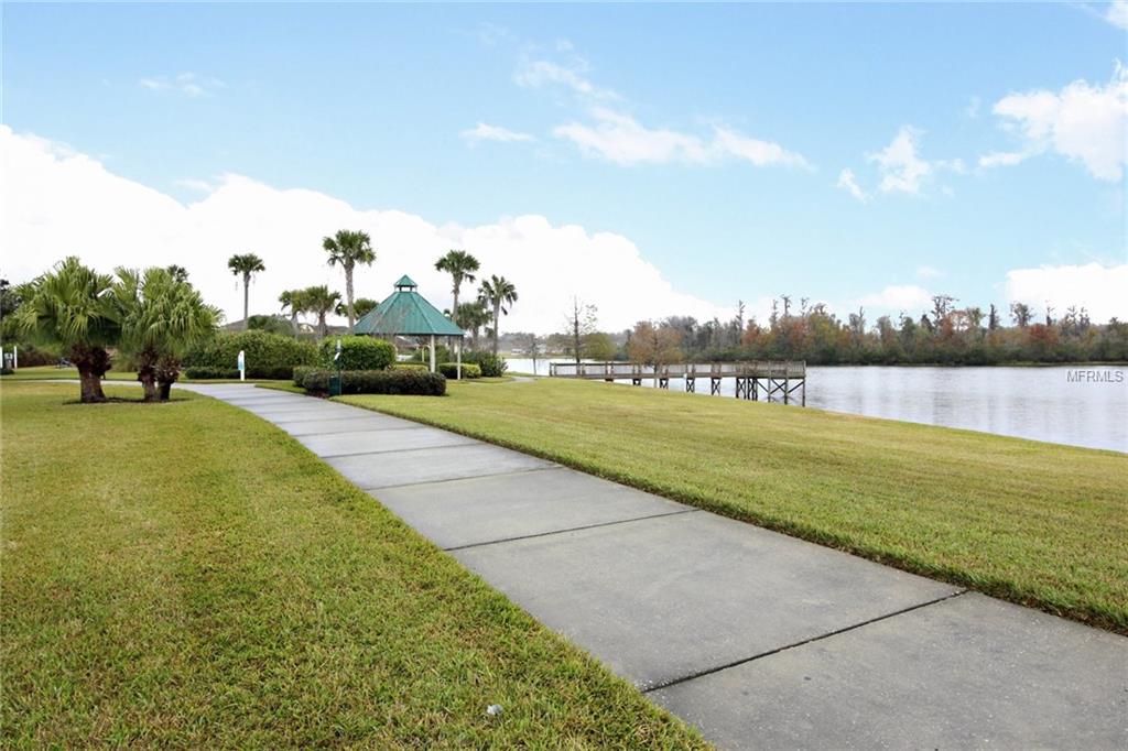 8493 LAKE WINDHAM AVENUE, ORLANDO, Florida 32829, 5 Bedrooms Bedrooms, 10 Rooms Rooms,3 BathroomsBathrooms,Residential,For sale,LAKE WINDHAM,O5556161