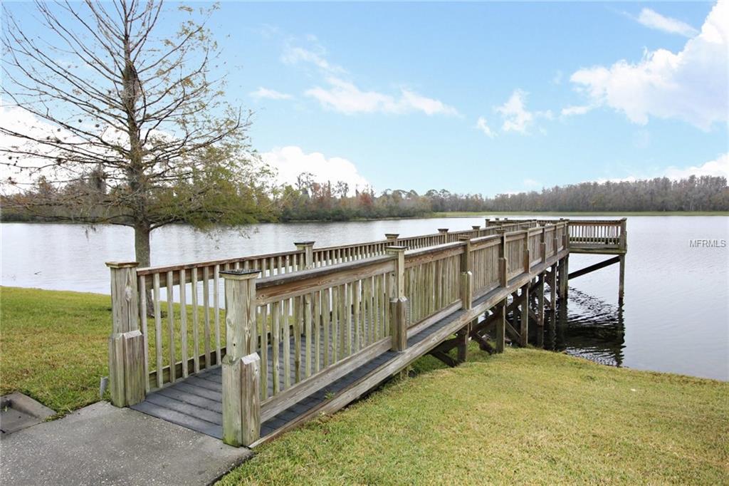 8493 LAKE WINDHAM AVENUE, ORLANDO, Florida 32829, 5 Bedrooms Bedrooms, 10 Rooms Rooms,3 BathroomsBathrooms,Residential,For sale,LAKE WINDHAM,O5556161