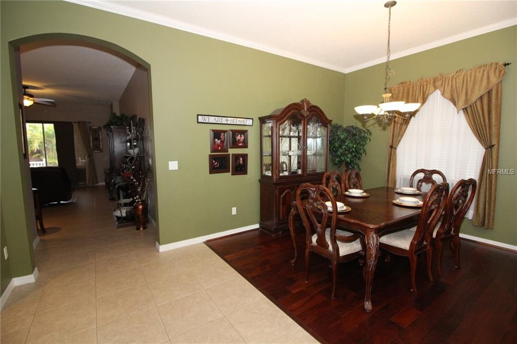 8493 LAKE WINDHAM AVENUE, ORLANDO, Florida 32829, 5 Bedrooms Bedrooms, 10 Rooms Rooms,3 BathroomsBathrooms,Residential,For sale,LAKE WINDHAM,O5556161