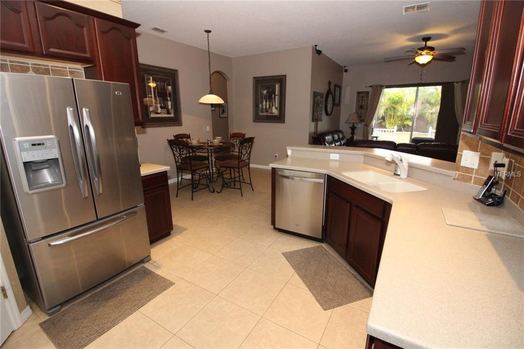 8493 LAKE WINDHAM AVENUE, ORLANDO, Florida 32829, 5 Bedrooms Bedrooms, 10 Rooms Rooms,3 BathroomsBathrooms,Residential,For sale,LAKE WINDHAM,O5556161