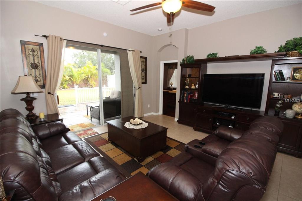 8493 LAKE WINDHAM AVENUE, ORLANDO, Florida 32829, 5 Bedrooms Bedrooms, 10 Rooms Rooms,3 BathroomsBathrooms,Residential,For sale,LAKE WINDHAM,O5556161