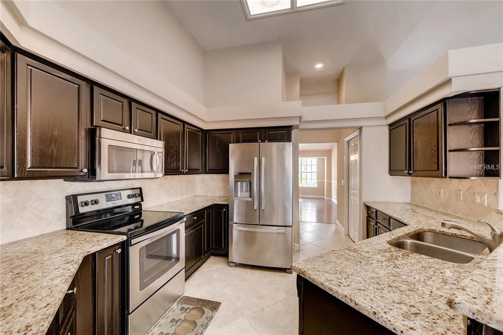 8013 WINPINE COURT, ORLANDO, Florida 32819, 4 Bedrooms Bedrooms, 5 Rooms Rooms,4 BathroomsBathrooms,Residential,For sale,WINPINE,O5542011