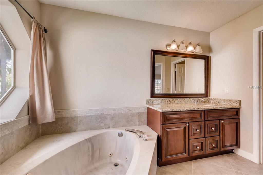 8013 WINPINE COURT, ORLANDO, Florida 32819, 4 Bedrooms Bedrooms, 5 Rooms Rooms,4 BathroomsBathrooms,Residential,For sale,WINPINE,O5542011